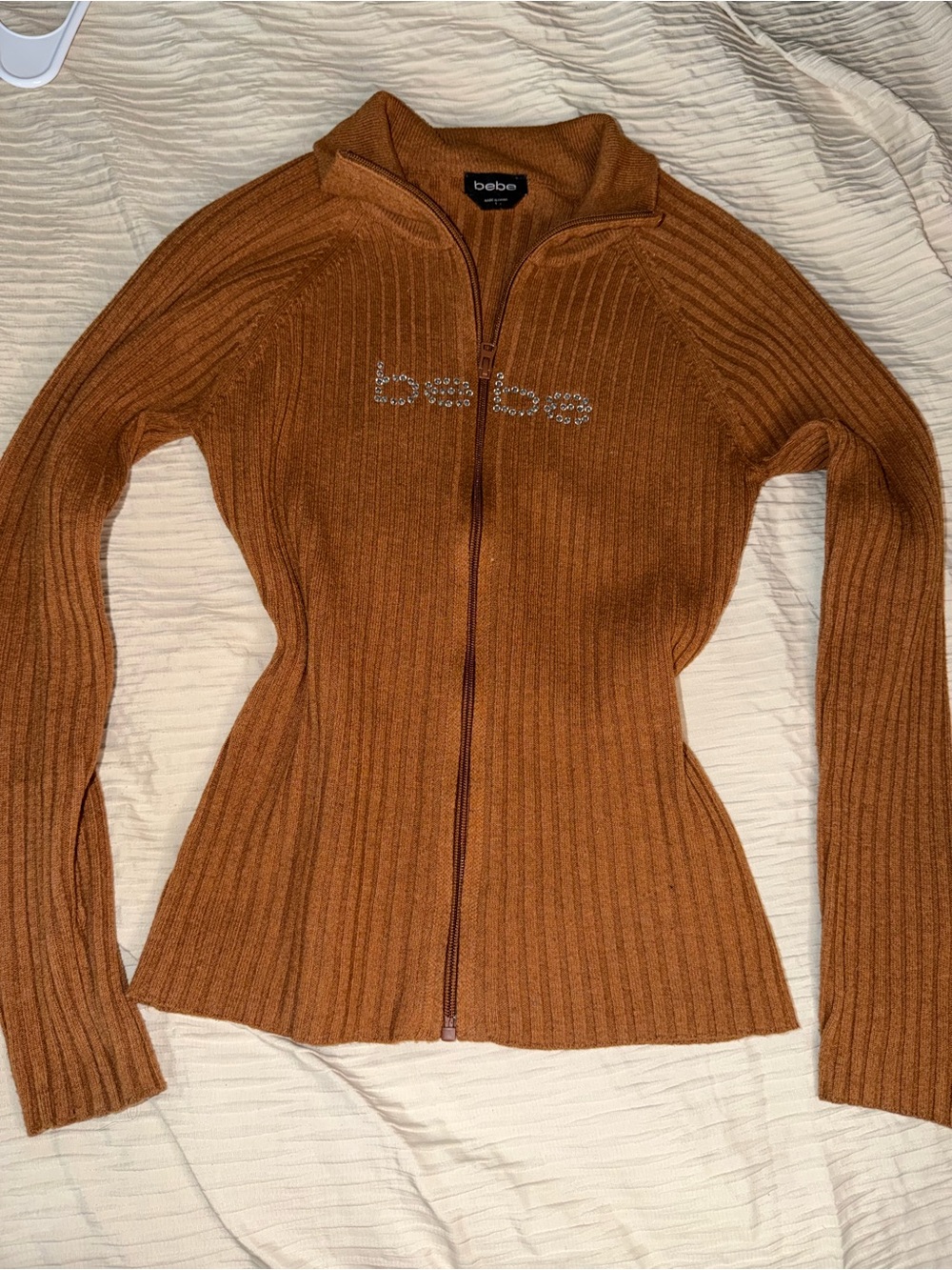 bebe Rust Ribbed Zip-Front Cardigan with Crystal Logo